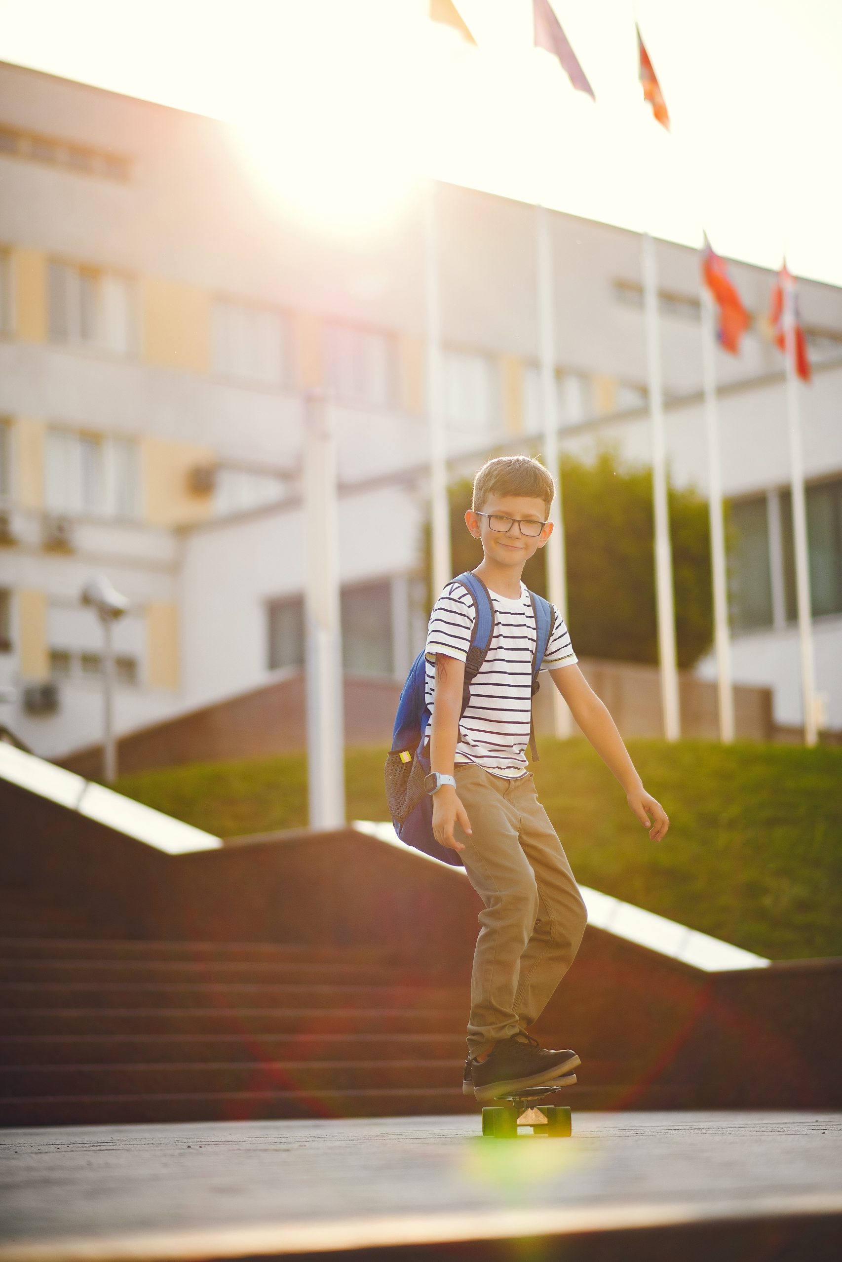 schoolboy-with-skate-backpack